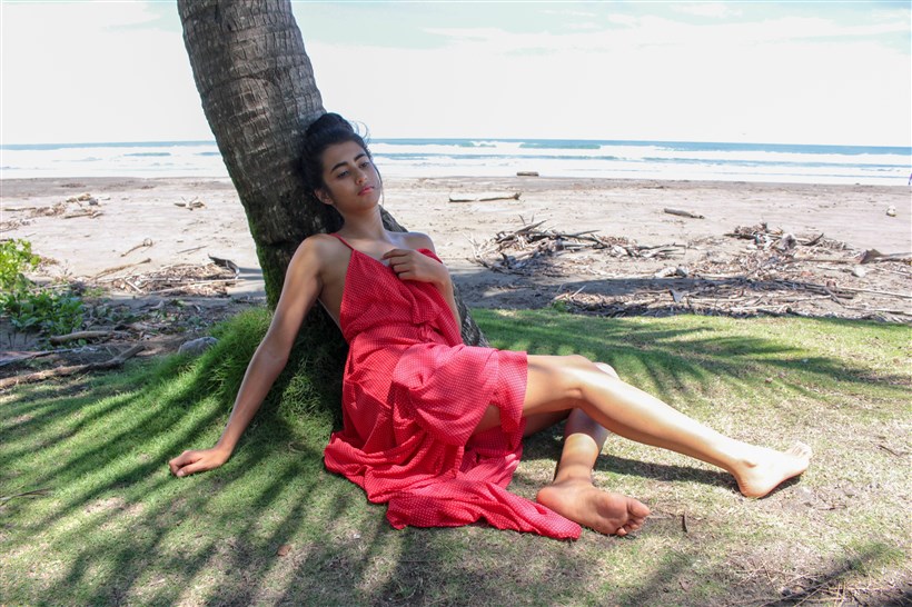 Red dress on the beach